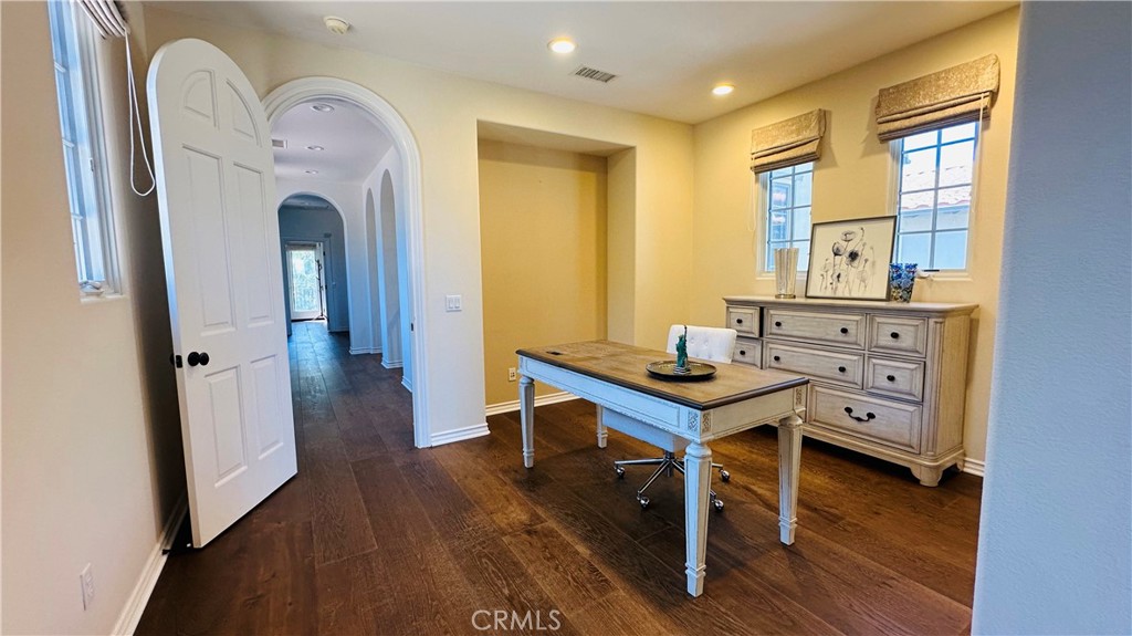 24 Silhouette Irvine, CA 92603 - Photo 20 of 36 a living room with furniture and wooden floor
