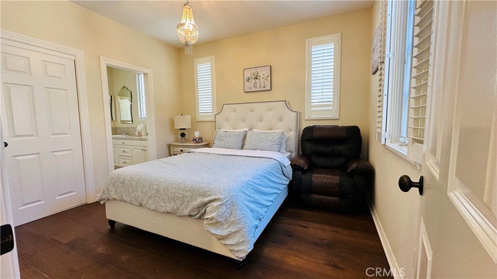 24 Silhouette Irvine, CA 92603 - Photo 21 of 36 a bedroom with a bed and a chair