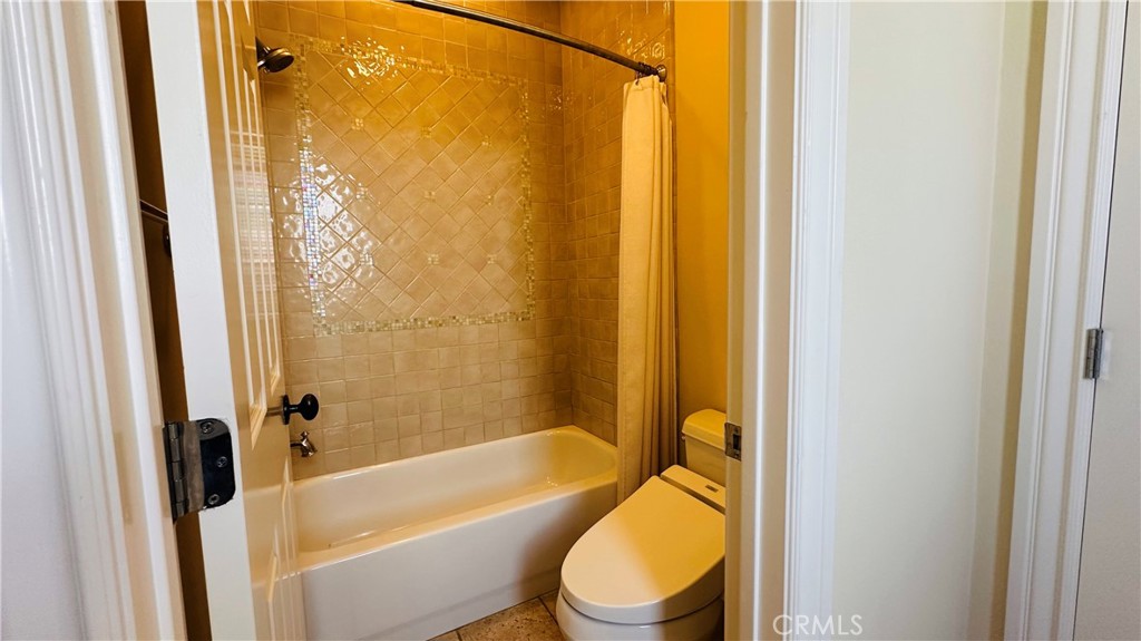 24 Silhouette Irvine, CA 92603 - Photo 24 of 36 a bathroom with a toilet and shower