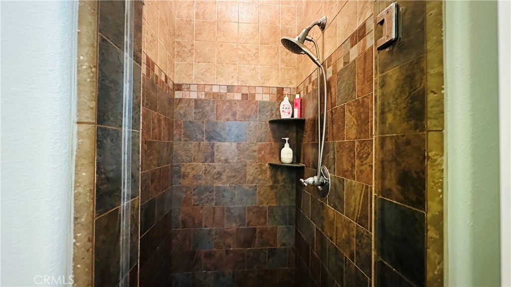 24 Silhouette Irvine, CA 92603 - Photo 28 of 36 a bathroom with a shower