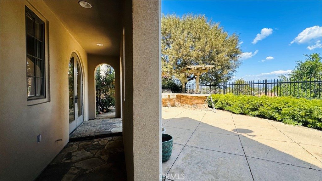 24 Silhouette Irvine, CA 92603 - Photo 33 of 36 a view of a back yard from a corridor