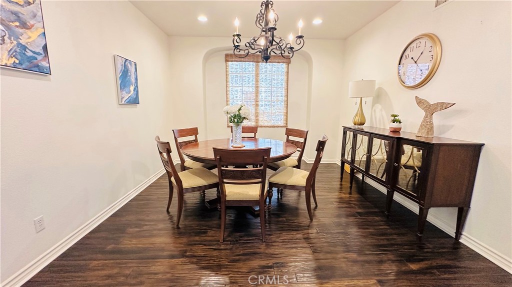 24 Silhouette Irvine, CA 92603 - Photo 8 of 36 a view of a dining room with furniture window and wooden floor