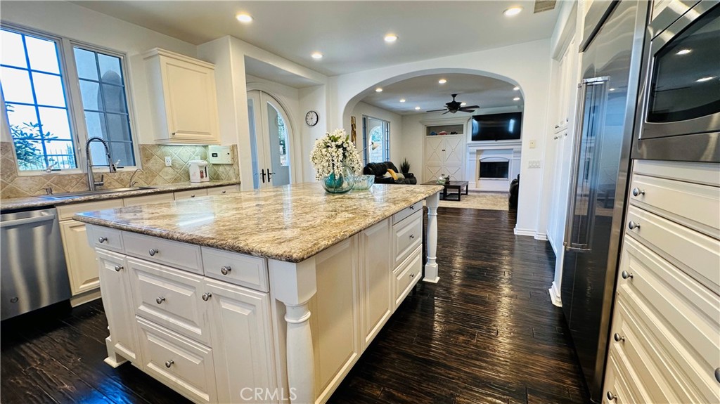 24 Silhouette Irvine, CA 92603 - Photo 9 of 36 a kitchen with sink stove and refrigerator