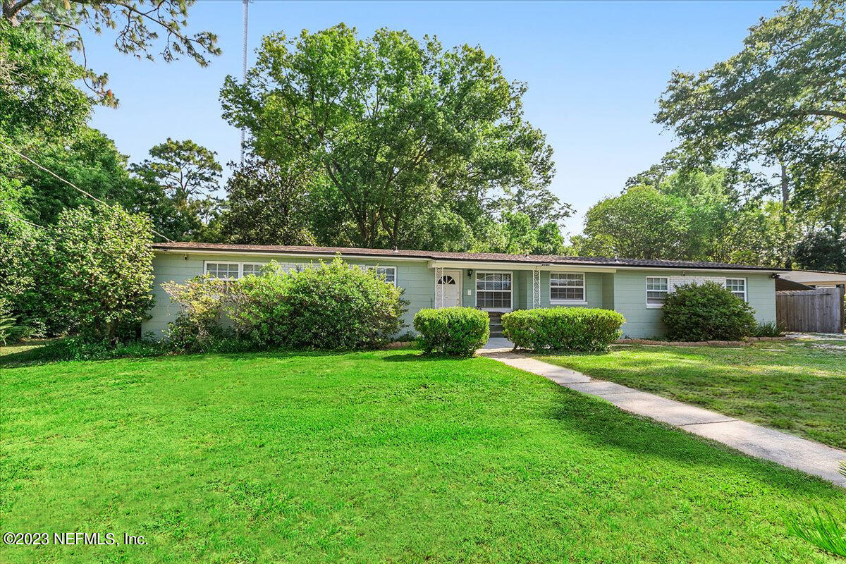 8543 Synhoff Drive Jacksonville, FL 32216 - Photo 1 of 19 a view of a house with a yard