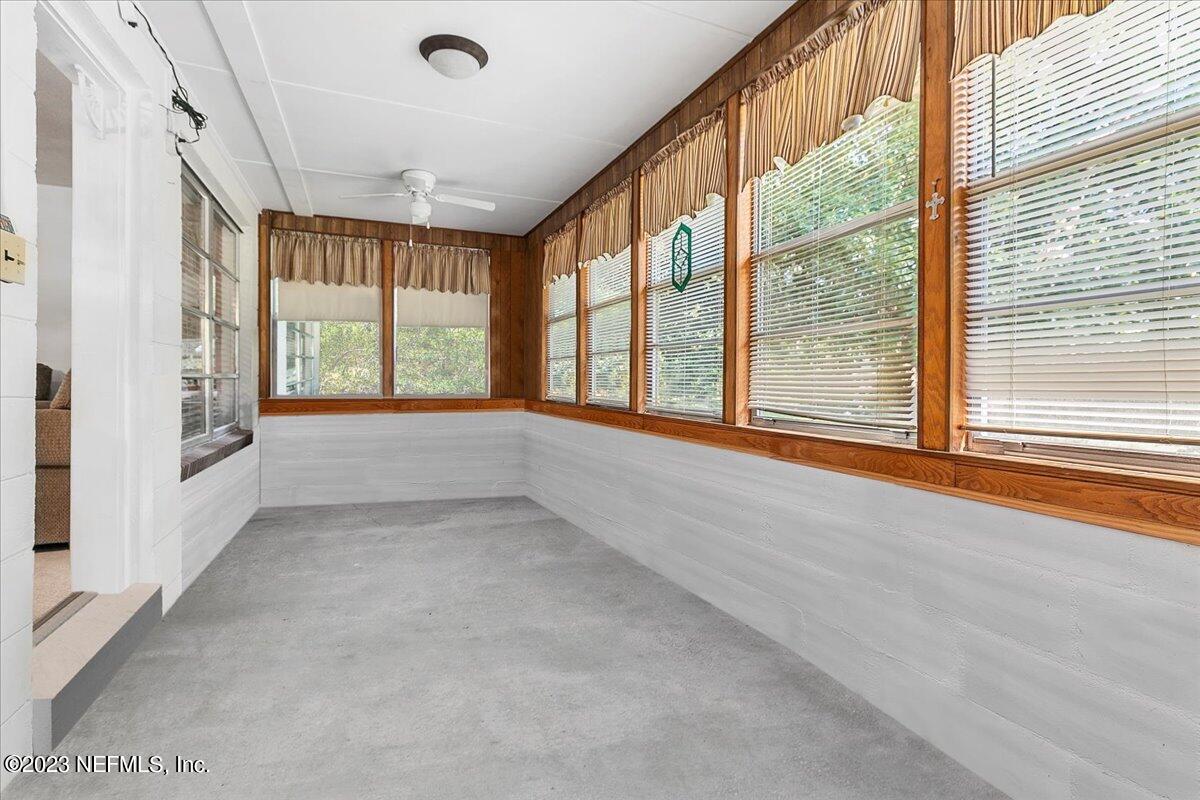 8543 Synhoff Drive Jacksonville, FL 32216 - Photo 16 of 19 a view of an empty room with a window