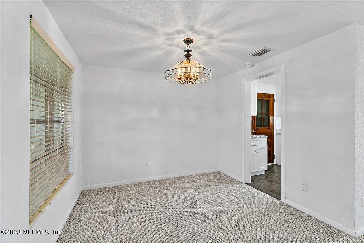 8543 Synhoff Drive Jacksonville, FL 32216 - Photo 7 of 19 a very nice looking room with a window