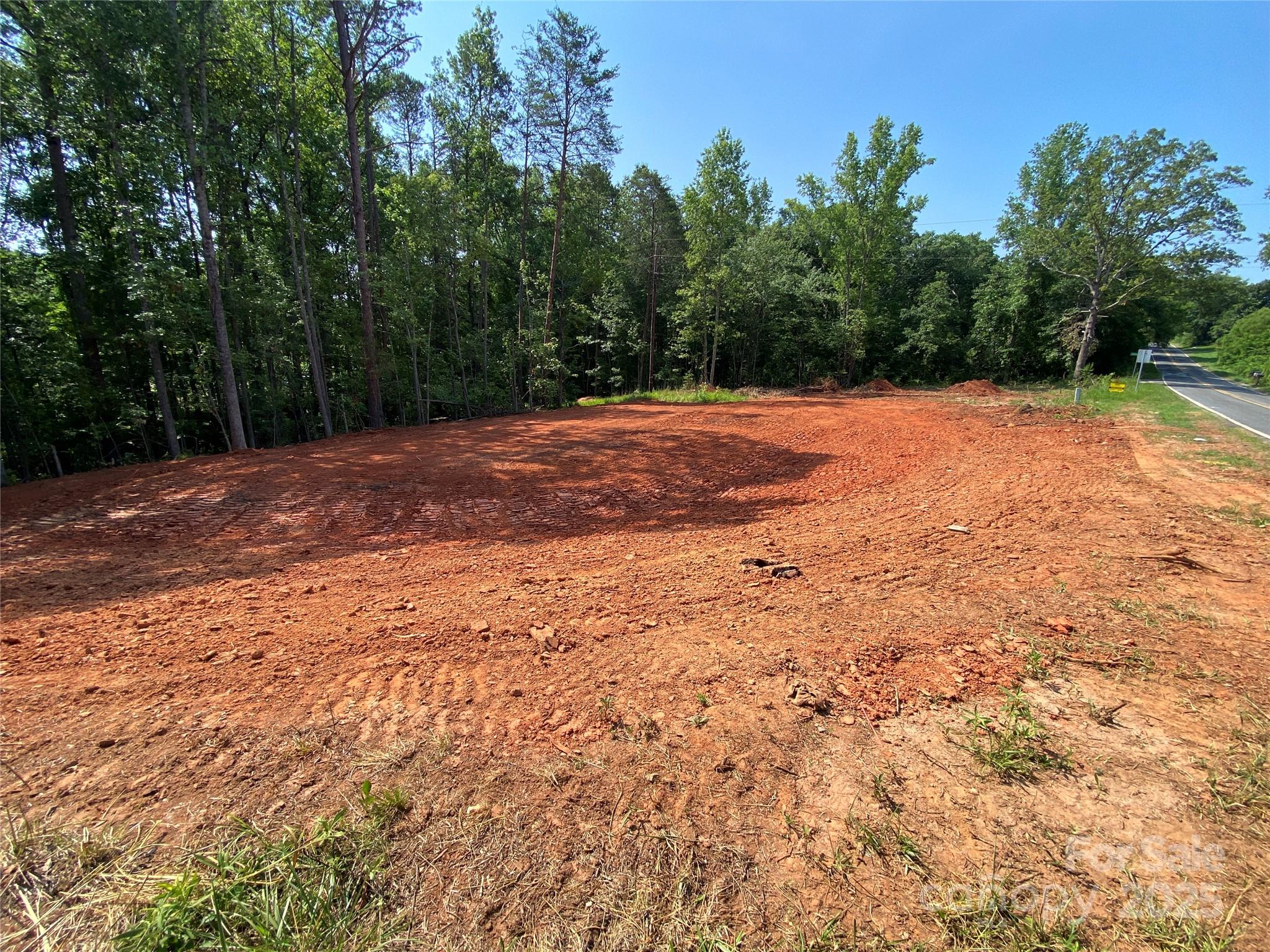 660 Pinehurst Road Ellenboro, NC 28040 - Photo 22 of 29 a view of a yard with a tree