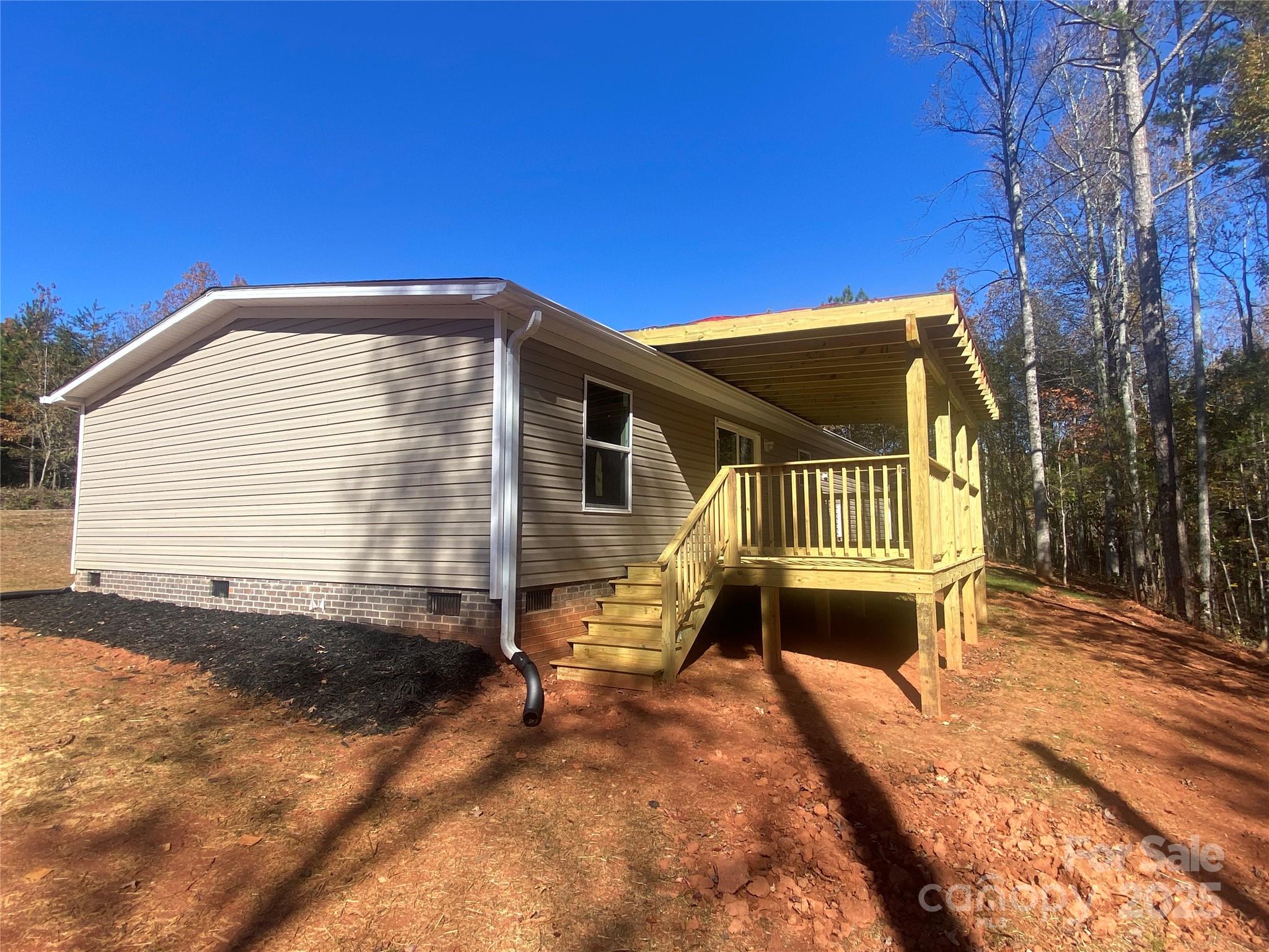 660 Pinehurst Road Ellenboro, NC 28040 - Photo 3 of 29 a front view of a house with a yard