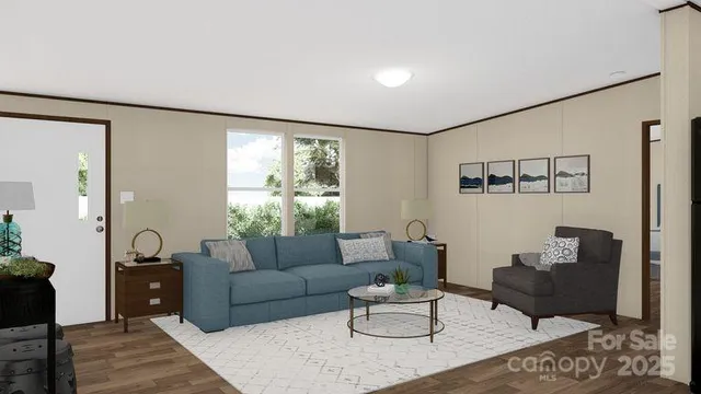 a living room with furniture and wooden floor