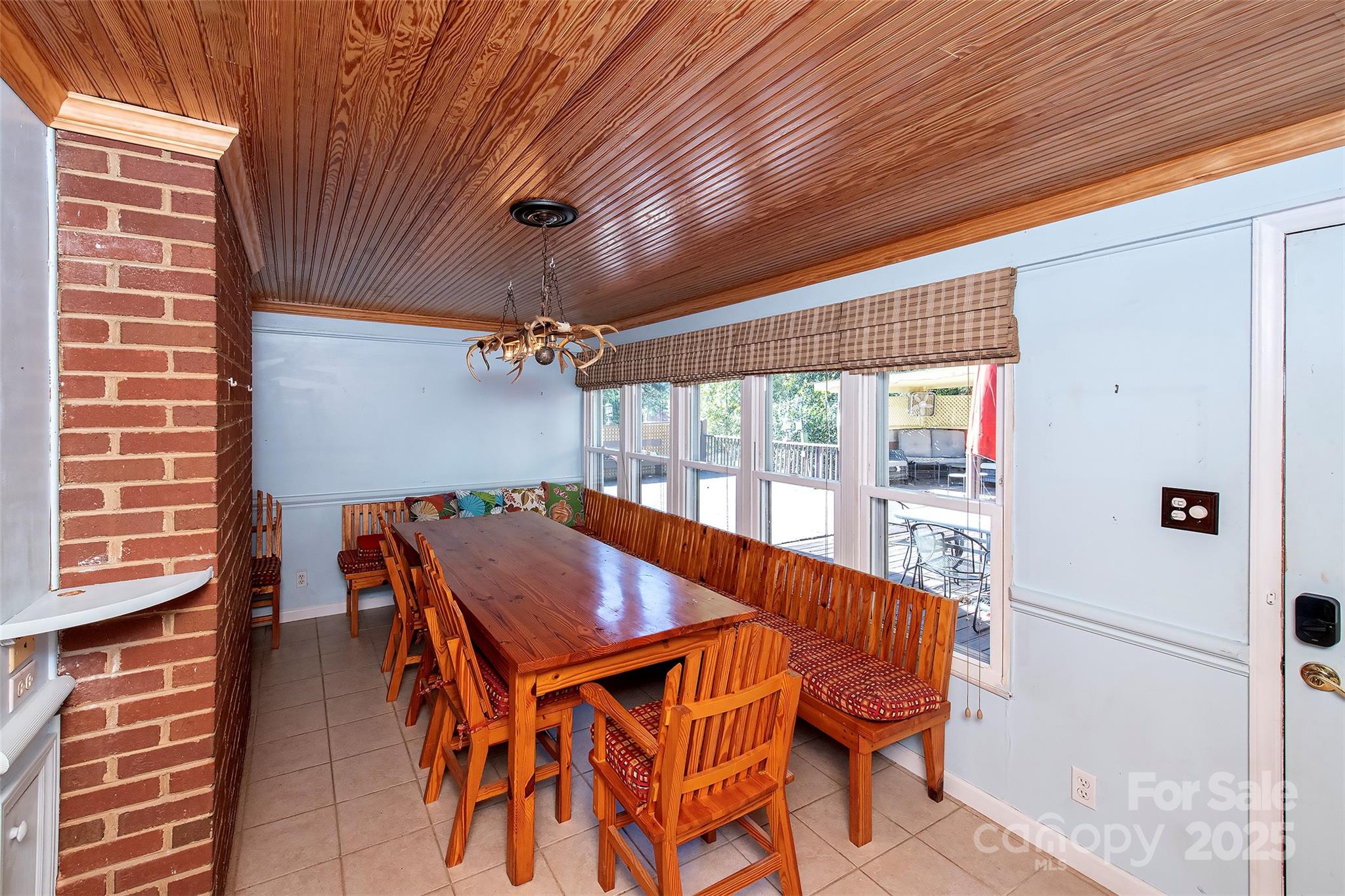 6332 Montpelier Road Charlotte, NC 28210 - Photo 16 of 30 a balcony with furniture and wooden floor