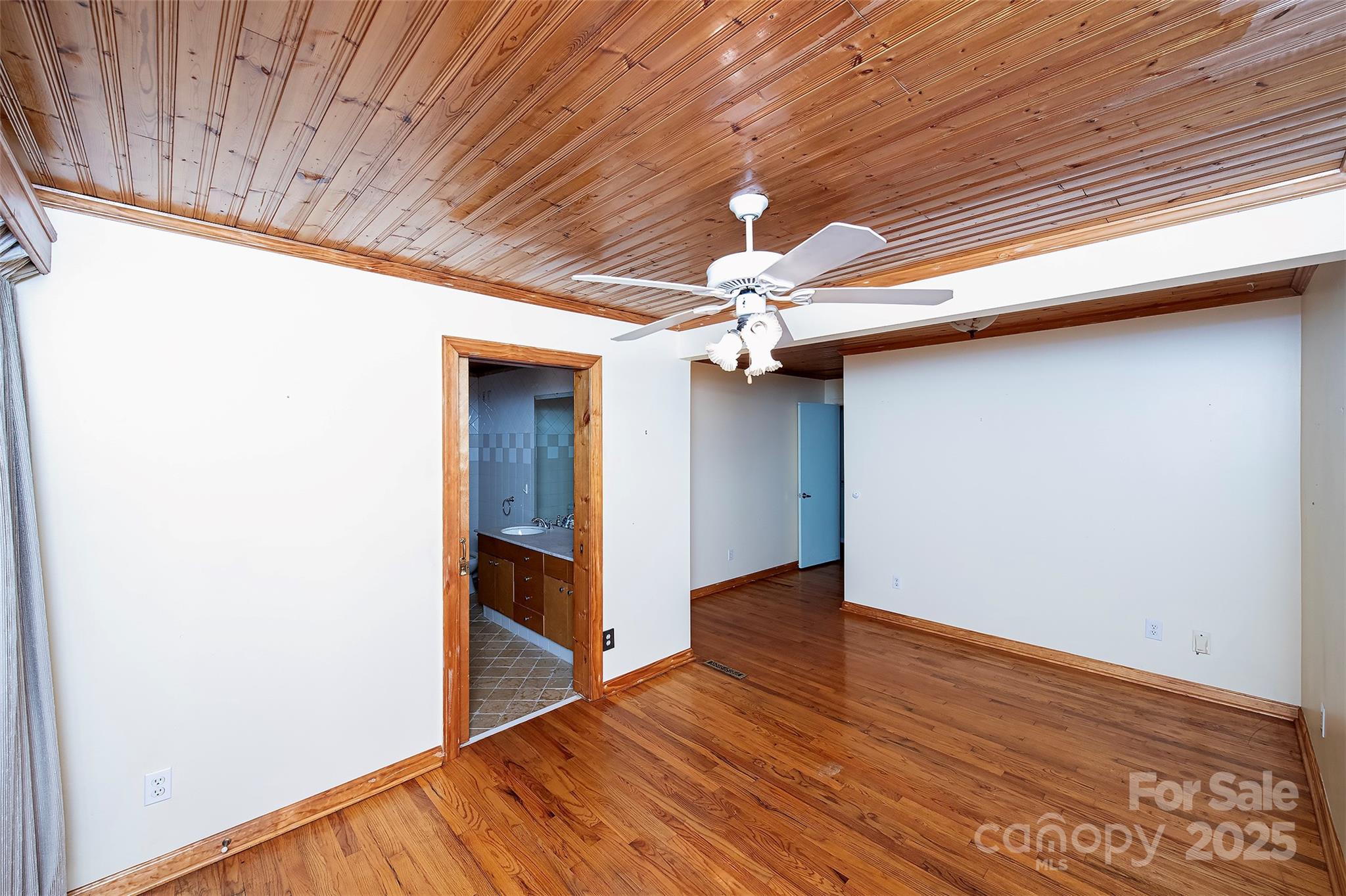 6332 Montpelier Road Charlotte, NC 28210 - Photo 23 of 30 wooden floor in an empty room