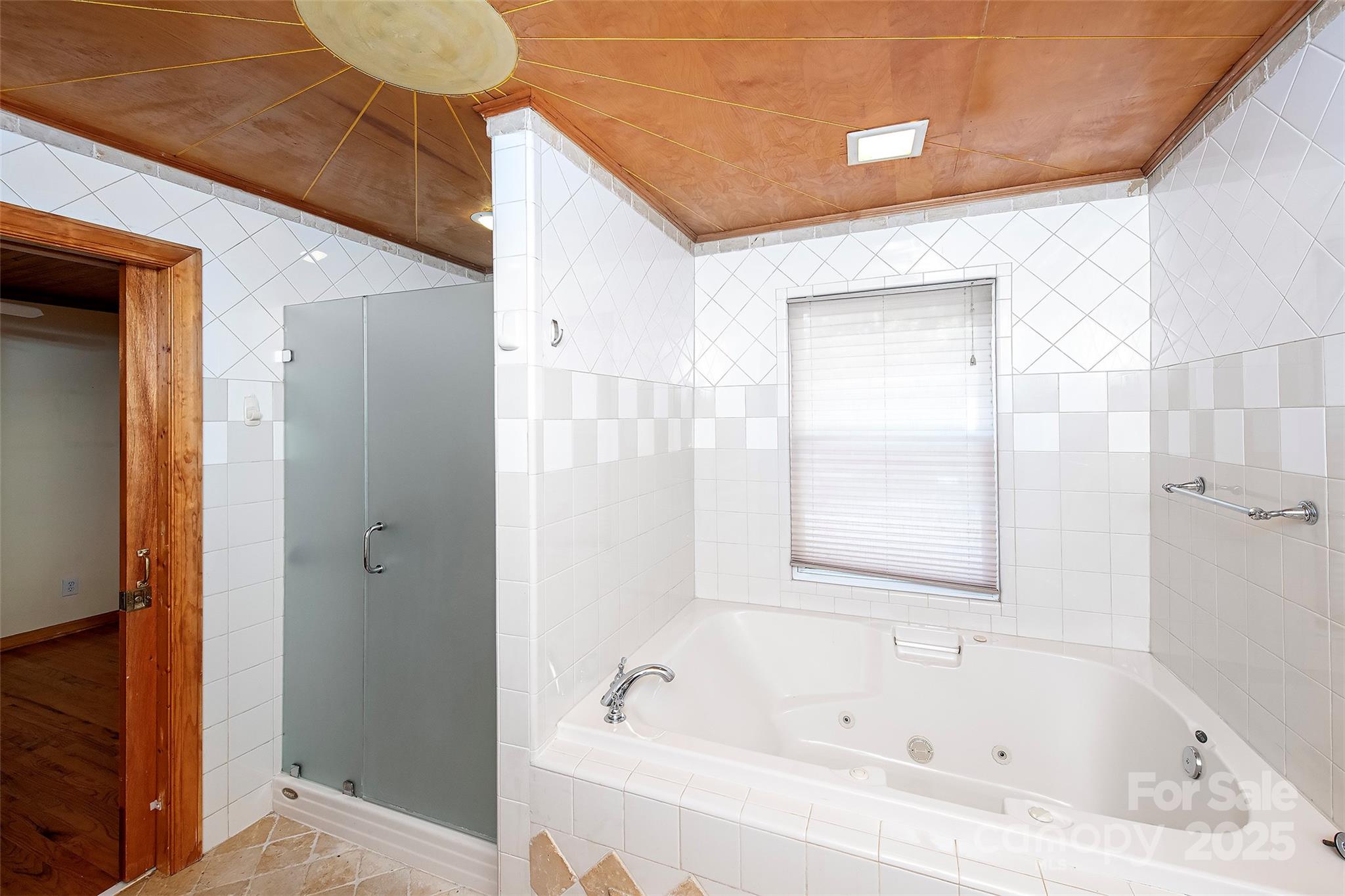 6332 Montpelier Road Charlotte, NC 28210 - Photo 25 of 30 a white bath tub sitting next to a bathroom sink