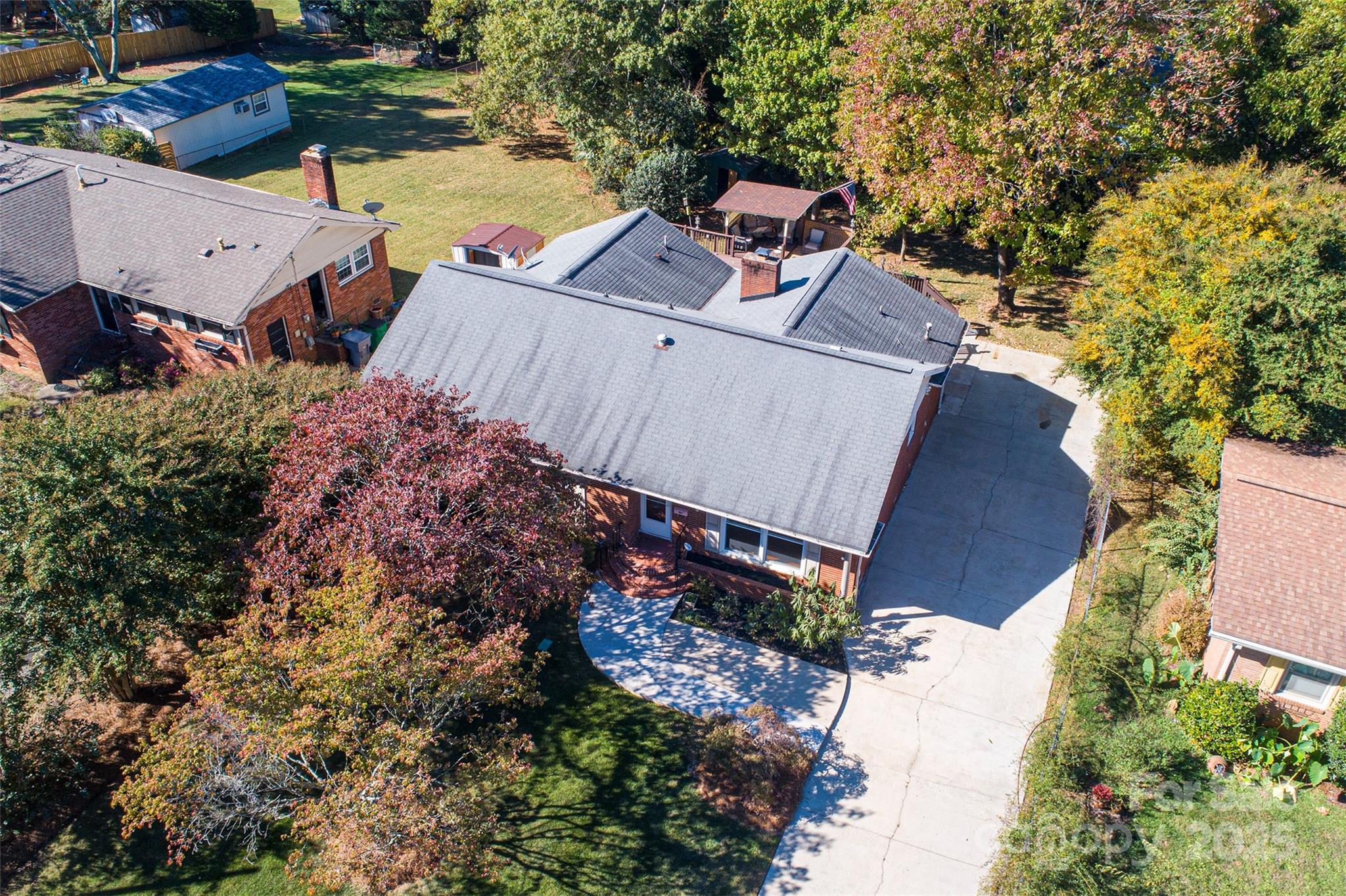 6332 Montpelier Road Charlotte, NC 28210 - Photo 6 of 30 an aerial view of a house with a yard and wooden fence