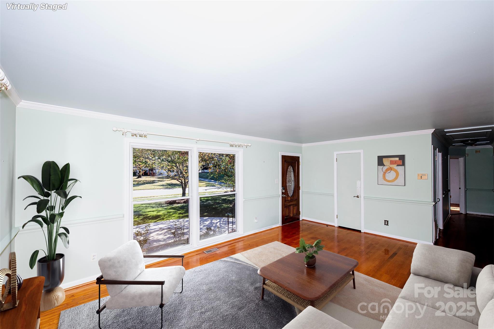6332 Montpelier Road Charlotte, NC 28210 - Photo 9 of 30 a living room with furniture and a window