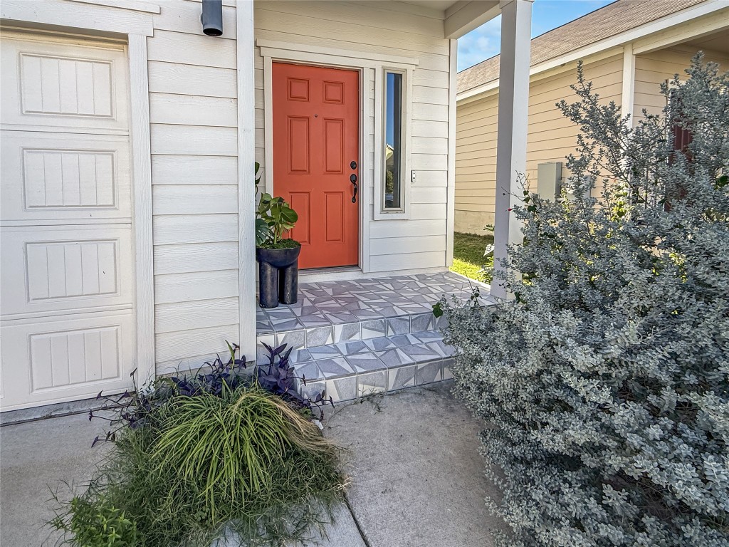 a view of a entryway door front of house
