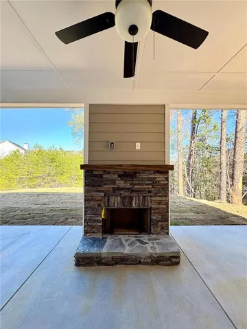 a living room with fireplace