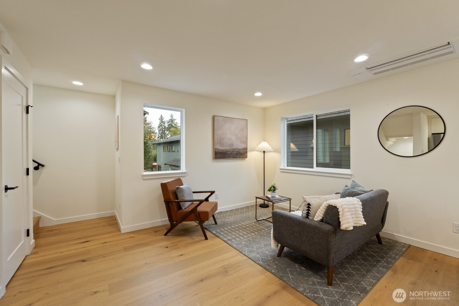 2725 Northeast 87th Street Seattle, WA 98115 - Photo 15 of 30 a living room with furniture and a window