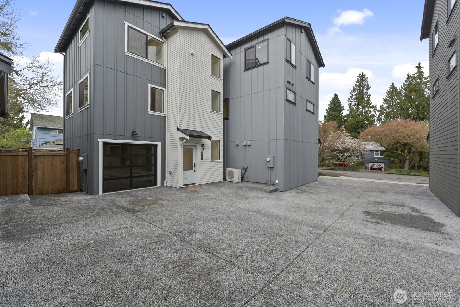 2725 Northeast 87th Street Seattle, WA 98115 - Photo 3 of 30 a view of a house with a yard and garage