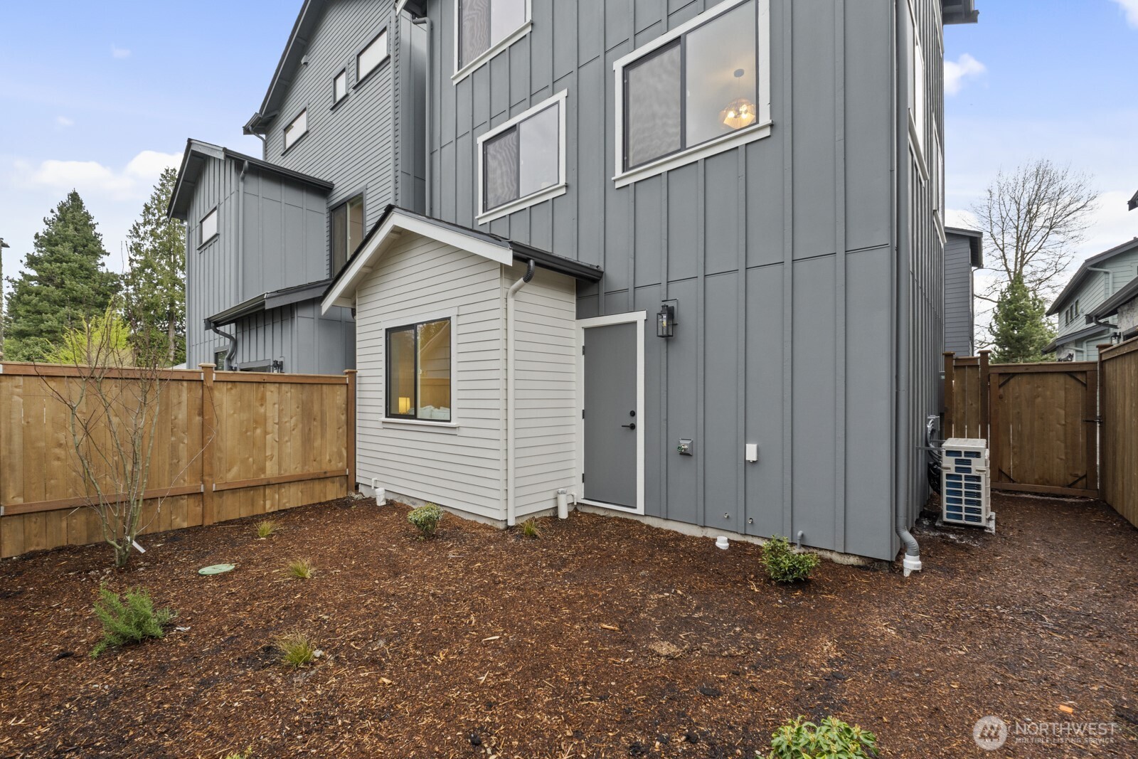 2725 Northeast 87th Street Seattle, WA 98115 - Photo 7 of 30 a view of a house with a backyard