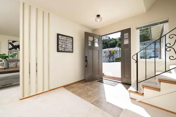 a view of a hallway with a large window