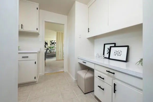 a view of cabinets with wooden floor