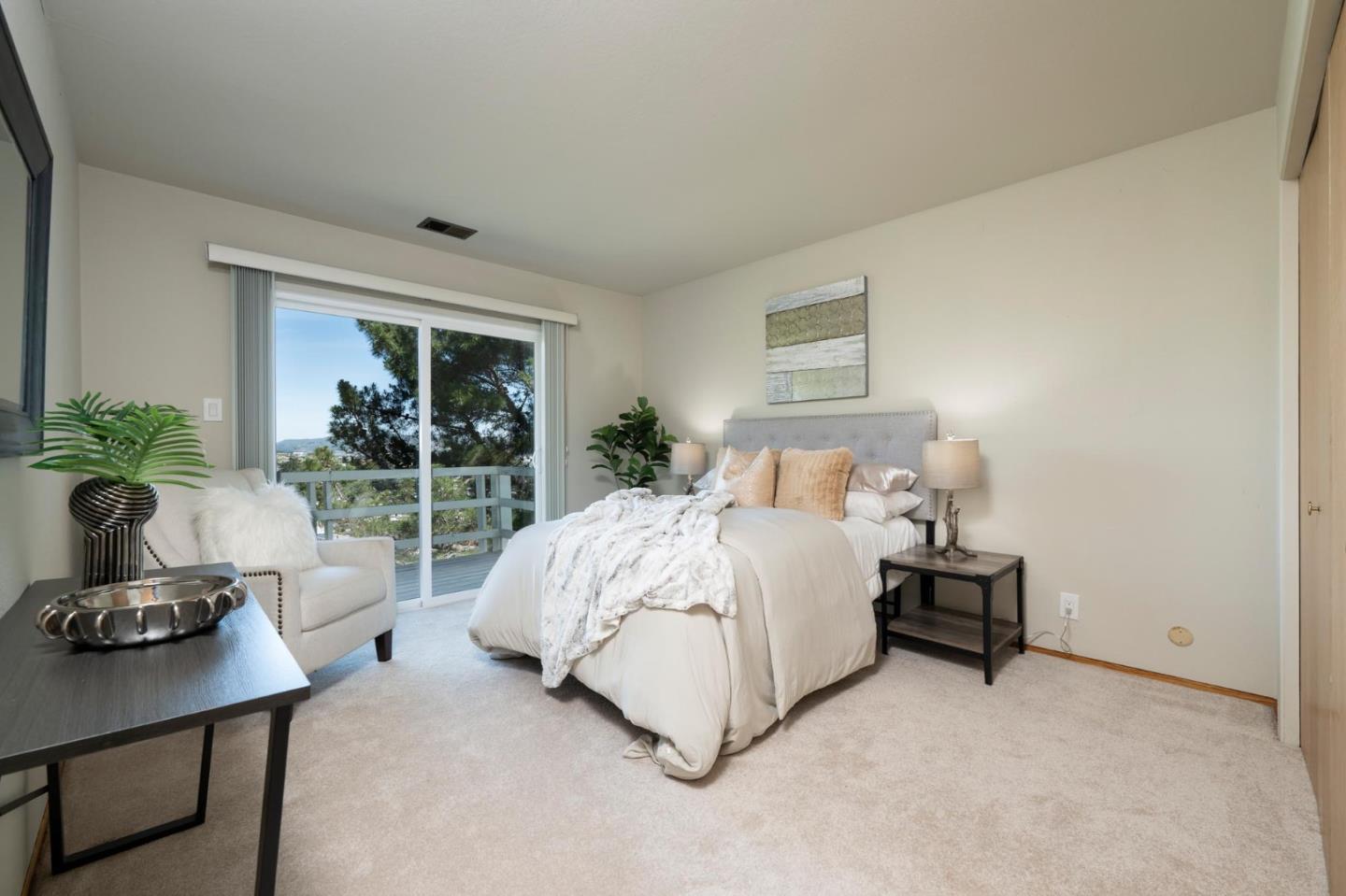 1255 Tuolumne Road Millbrae, CA 94030 - Photo 27 of 42 a bedroom with a bed and a window