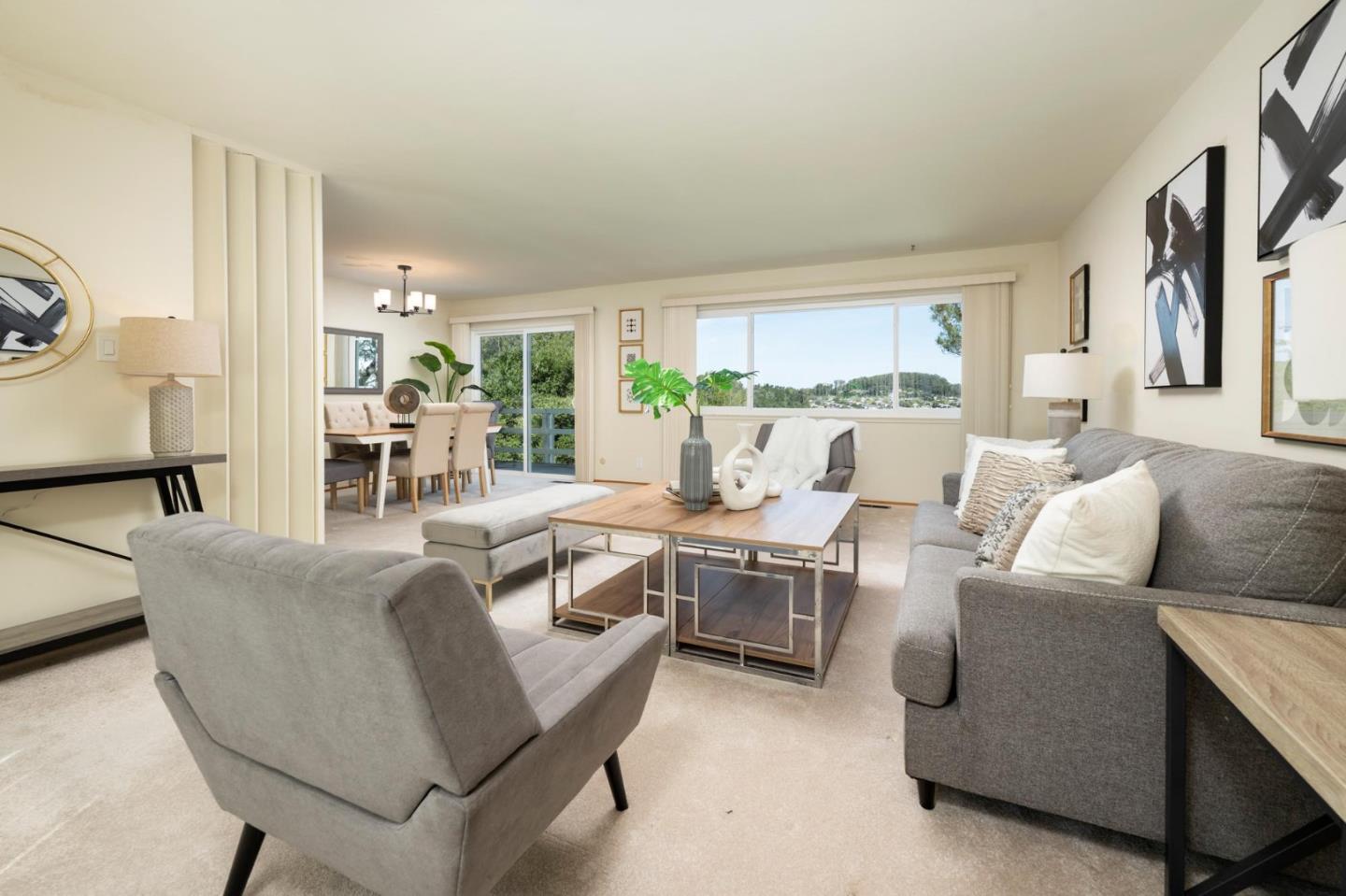 1255 Tuolumne Road Millbrae, CA 94030 - Photo 6 of 42 a living room with furniture and large windows