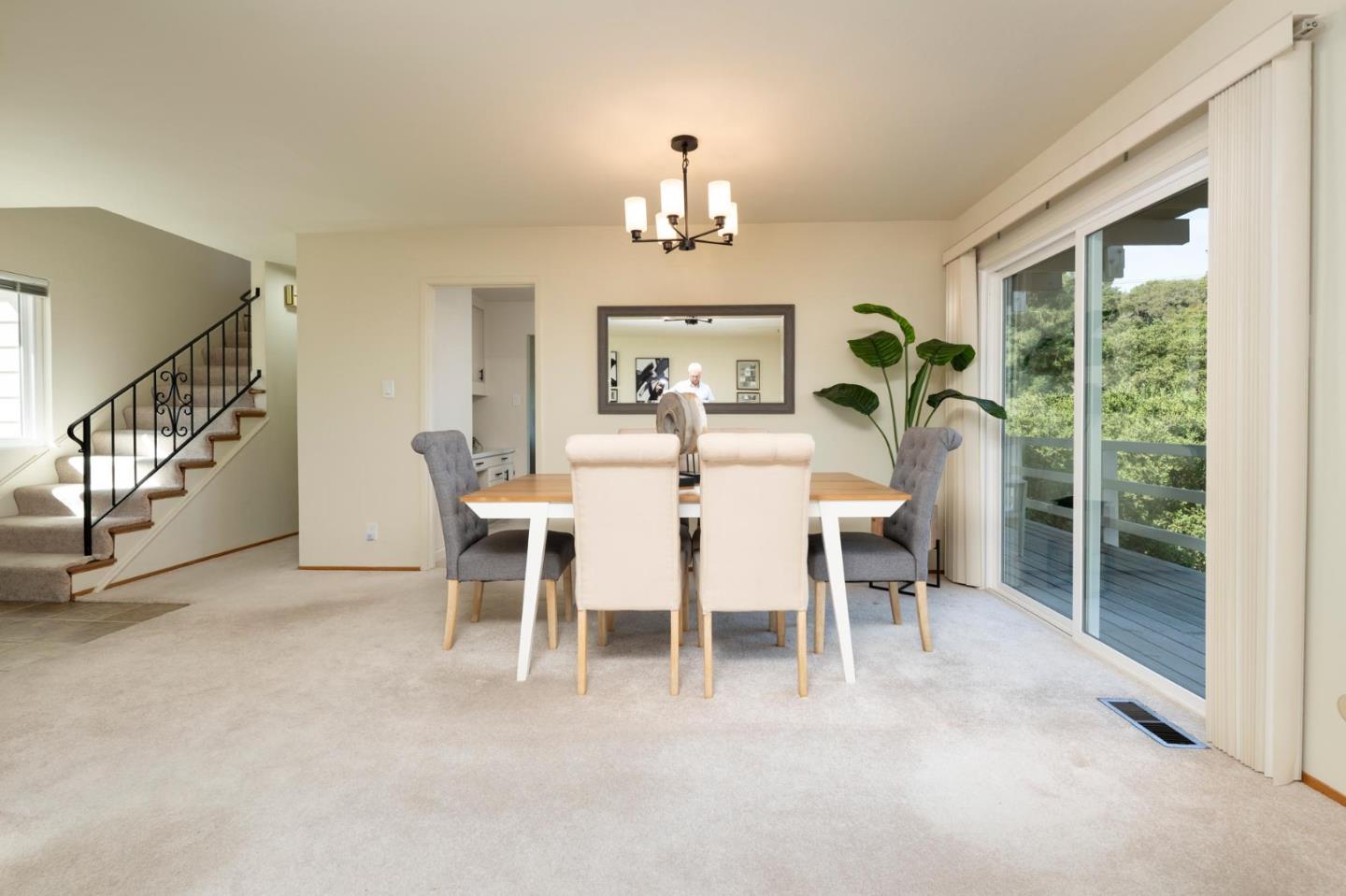 1255 Tuolumne Road Millbrae, CA 94030 - Photo 9 of 42 a dining room with furniture a chandelier and window