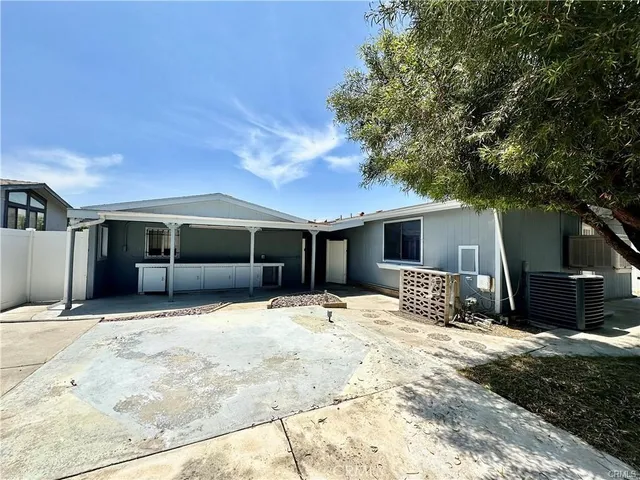 a house with trees in the background