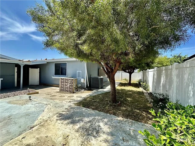 a house with yard in front of it