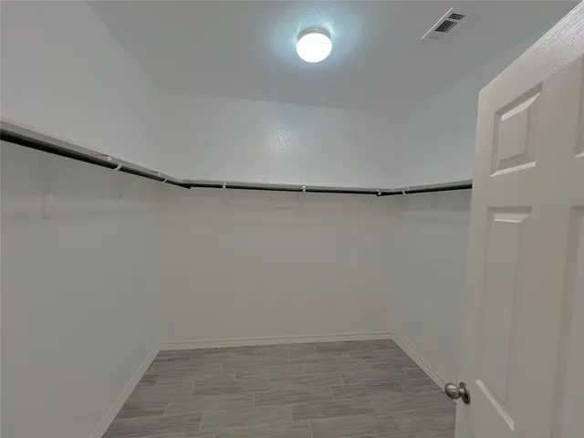 a view of a refrigerator in kitchen