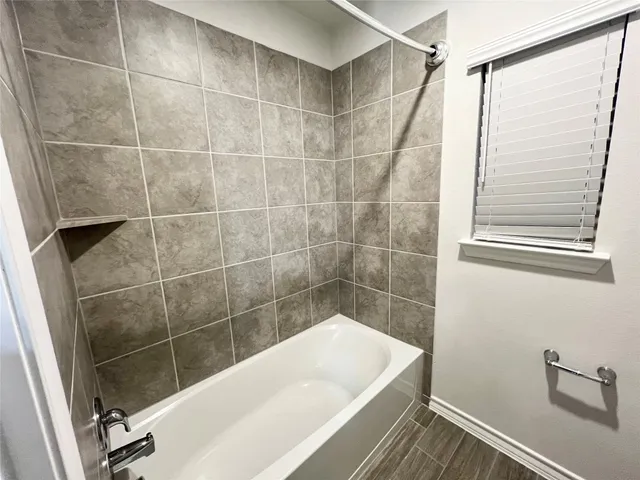 a bathroom with a bathtub