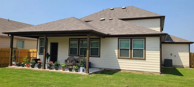 a house view with a garden space