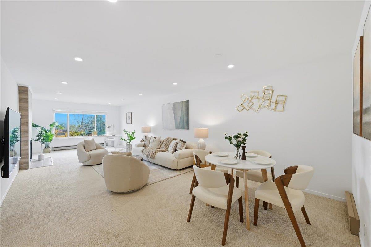 555 Palm Avenue, Unit 202 Millbrae, CA 94030 - Photo 13 of 40 a living room with furniture
