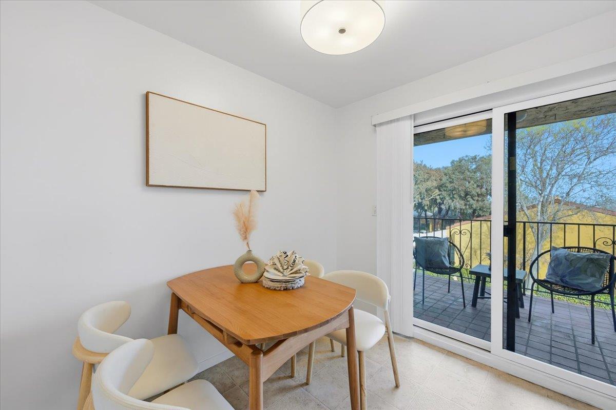 555 Palm Avenue, Unit 202 Millbrae, CA 94030 - Photo 17 of 40 a view of a dining room with furniture and wooden floor