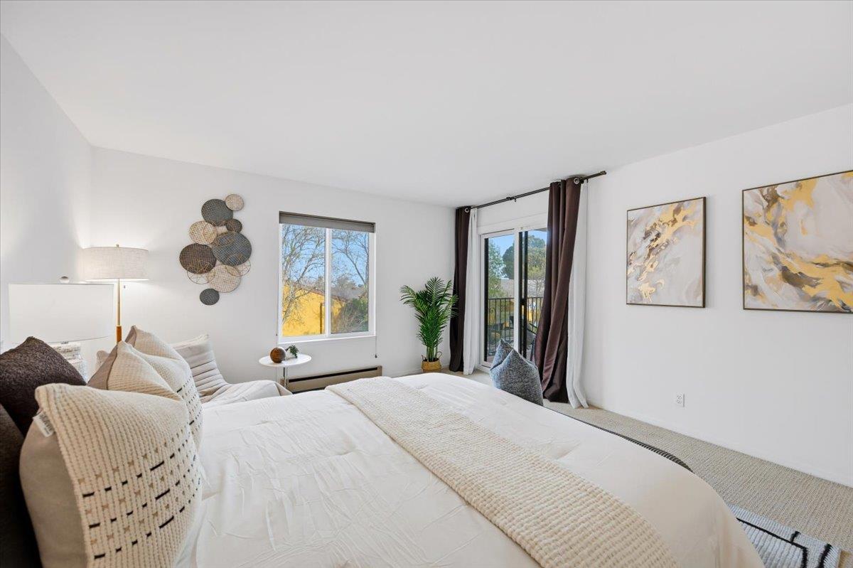 555 Palm Avenue, Unit 202 Millbrae, CA 94030 - Photo 26 of 40 a bedroom with a bed and window
