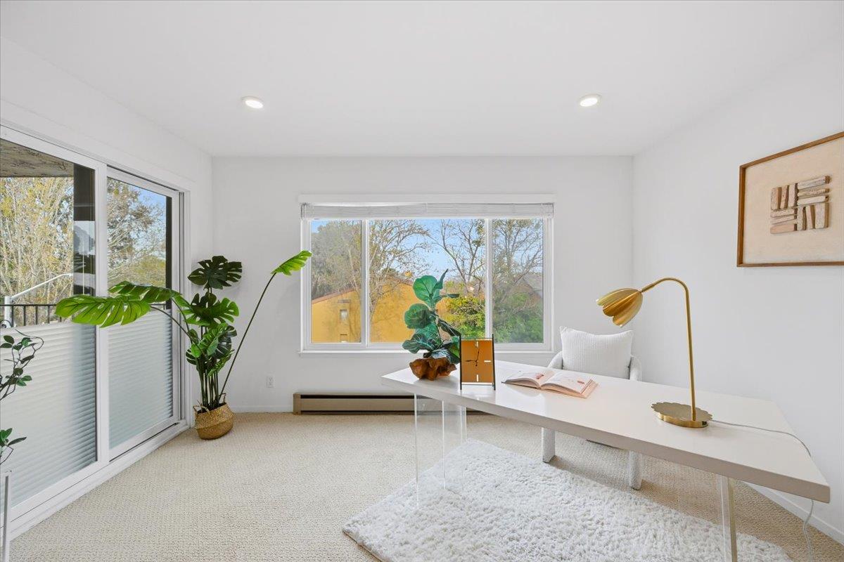 555 Palm Avenue, Unit 202 Millbrae, CA 94030 - Photo 27 of 40 a living room with furniture and a potted plant