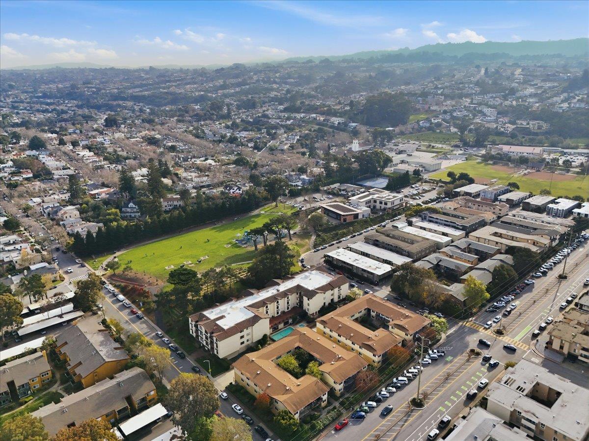 555 Palm Avenue, Unit 202 Millbrae, CA 94030 - Photo 37 of 40 an aerial view of residential houses with outdoor space