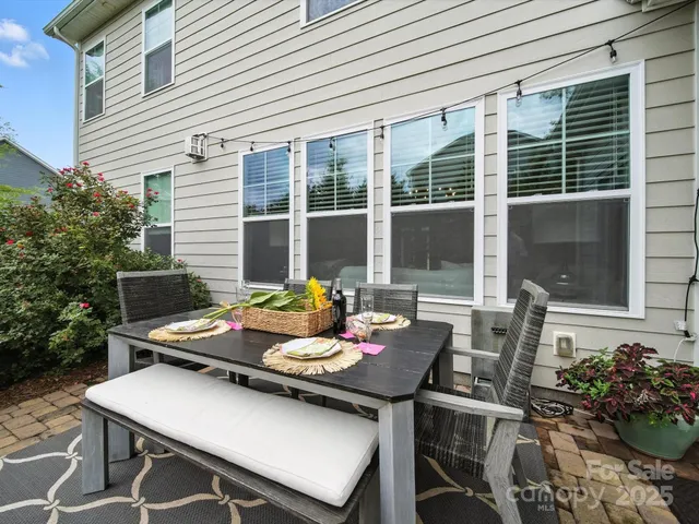 a view of a swimming pool with a yard