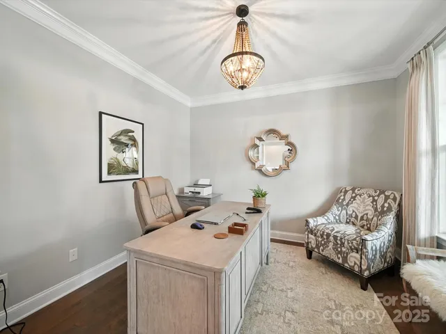 a bedroom with bed and a window