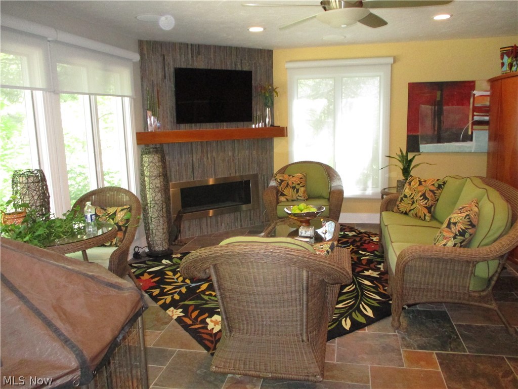 29099 Bryce Road Cleveland, OH 44124 - Photo 13 of 32 Sunroom with fireplace