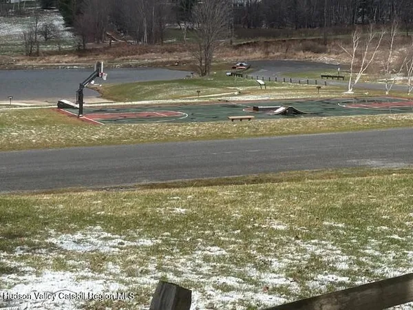 a view of swimming pool with trees