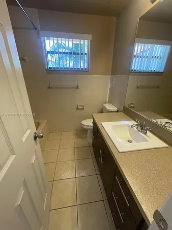 an empty room with closet area