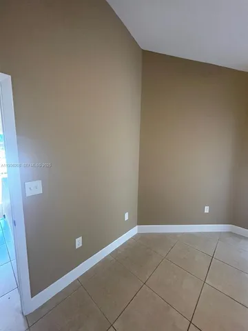 wooden floor and cabinet in a room