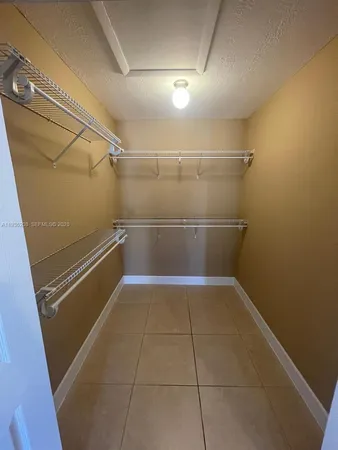 a view of a room with rack on the wall
