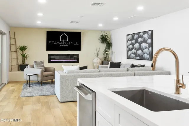 a bedroom with a bed and a table