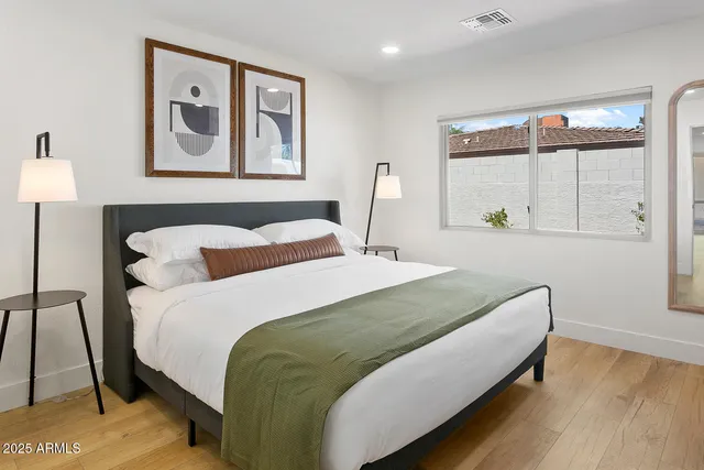 a view of a swimming pool with a yard