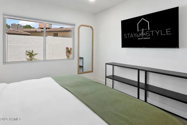 a kitchen with a stove and a white kitchen counter top