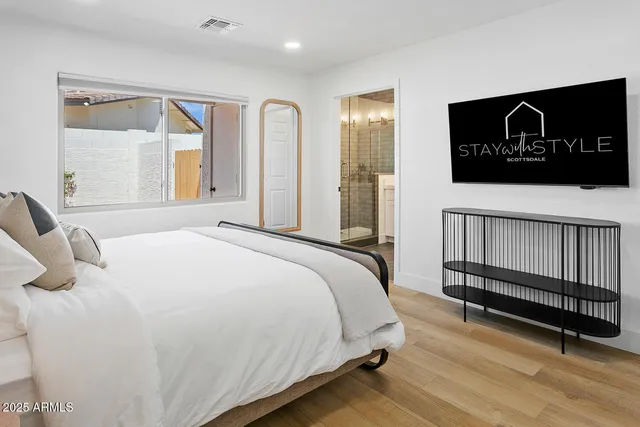 a swimming pool with outdoor seating and yard