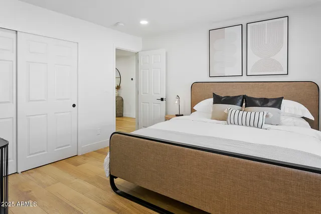 a view of a swimming pool with outdoor seating